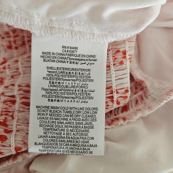 NWT BCBGeneration Heart Print Flutter Waist Peplum Sheer Fluted Sleeves Top M - Picture 11 of 13